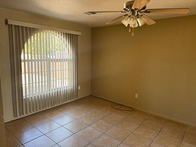 Building Photo - Enjoy this Fully Fenced San Luis Home