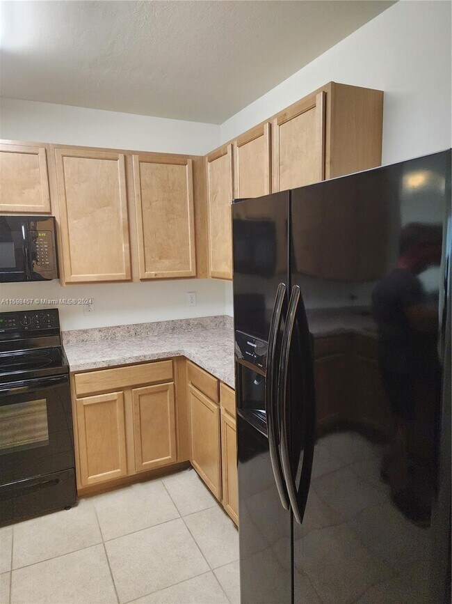 Building Photo - 7633 W Lenox Cir