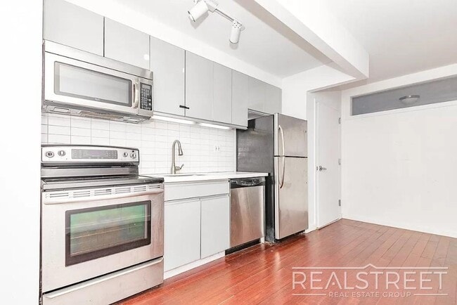 Building Photo - Stylish 2-Bedroom Bushwick Apartment with Huge Private Balcony & Prime Location