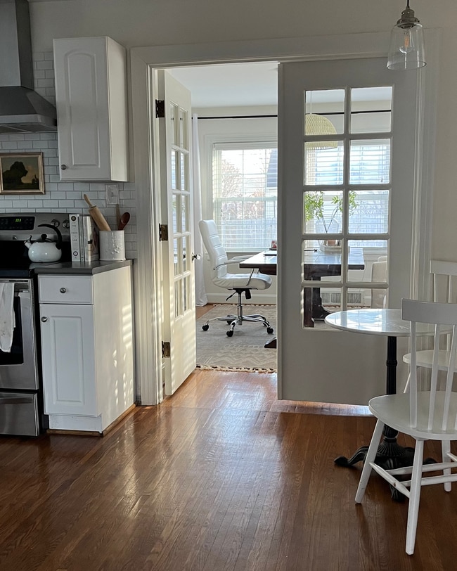 Off the living room, there's an eat in kitchen with updated stainless steel vent hood and appliances - 4012 Winchester Rd