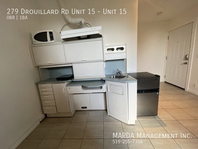 Photo du bâtiment - COZY BACHELOR UNIT - INCLUSIVE + FREE WIFI!!