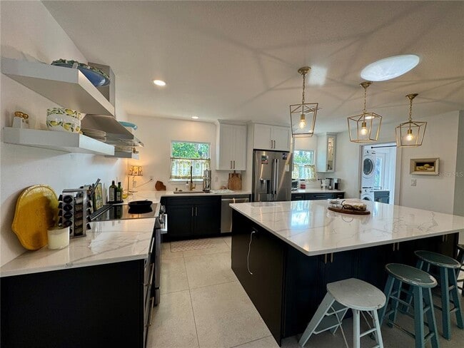 Building Photo - 7372 Melaleuca Way