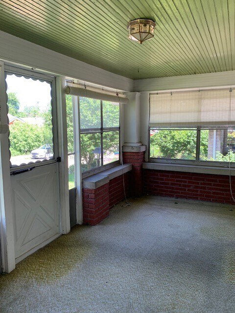 Enclosed front porch - 1219 S Washington St