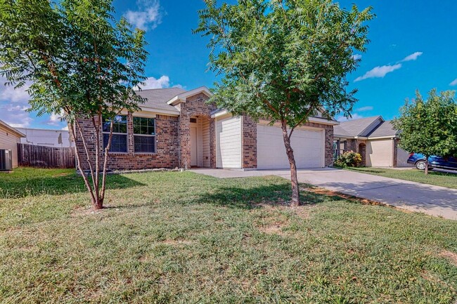 Building Photo - Move-In Ready! Welcome to Your Stylish Enc...