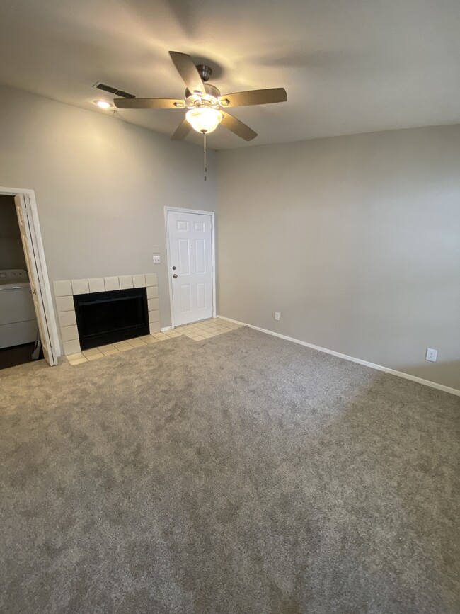 Living room with fireplace - 1134 Briarhill Ln NE