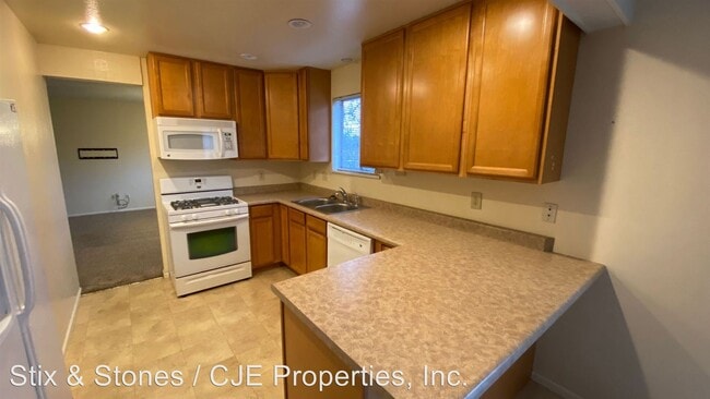 Building Photo - 9113 E Chenango Ave