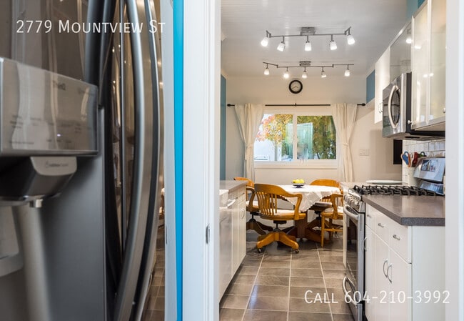 Photo du bâtiment - Charming Rancher With Basement