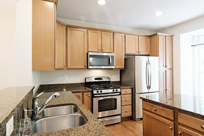 Building Photo - Dog-Friendly 4BR Cherry Hill Townhome with 2-Car Garage