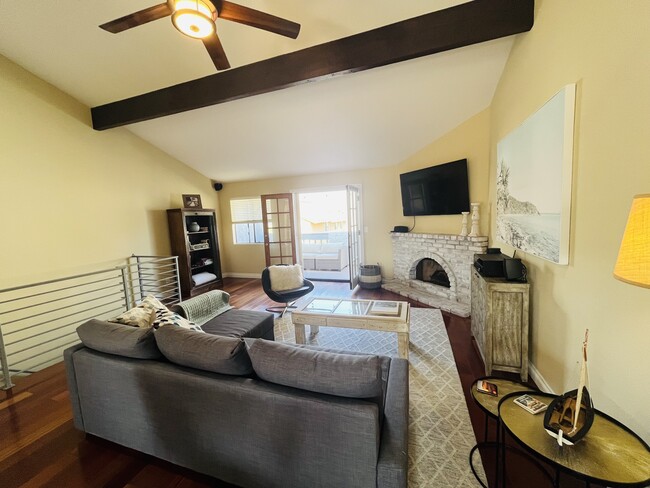 Open living area with big balcony in the front - 106 S Lucia Ave