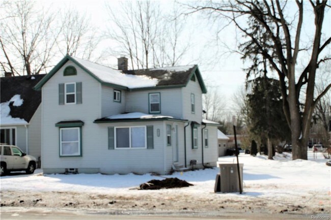 Building Photo - 56733 Grand River Ave