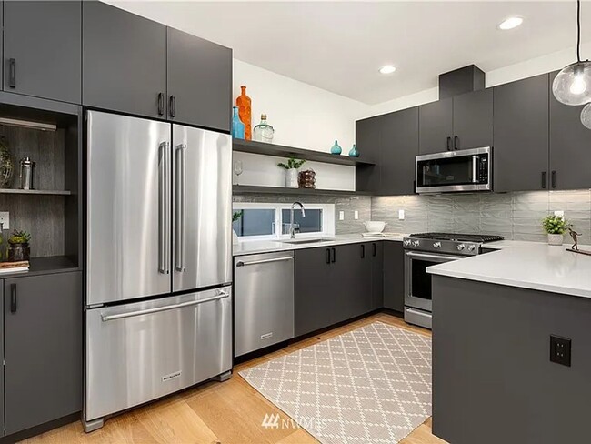 Building Photo - Modern Beacon Hill Home with Rooftop Deck & Sweeping Seattle Views