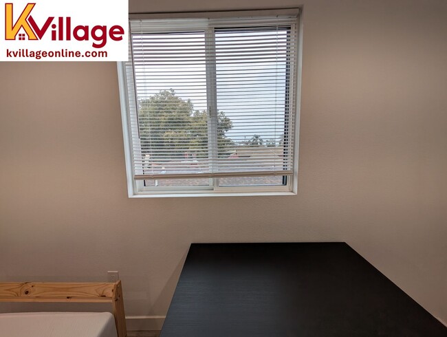 Building Photo - Co-living bedroom + bathroom, shared kitch...