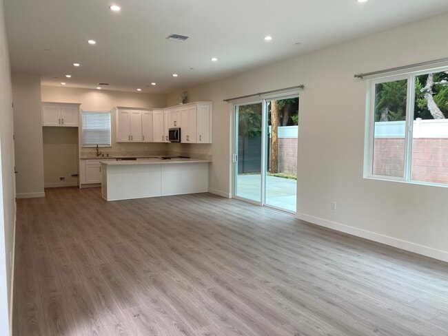 view from living/dining area to the open kitchen - 6926 Encino Ave