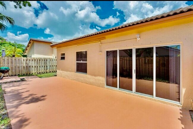 Building Photo - 8766 SW 213th Ter