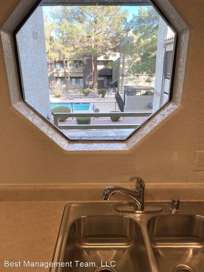Building Photo - 2 br, 1 bath House - 5050 S. Rainbow #203