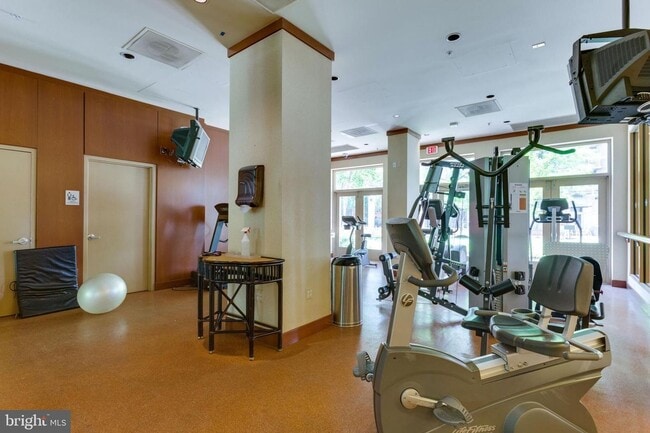 Building Photo - This contemporary, sun-drenched condo is perfect for you!