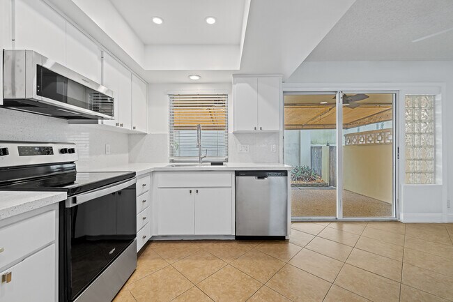 New Counters, Lighting, Updated Cabinetry - 1958 NE 33rd St