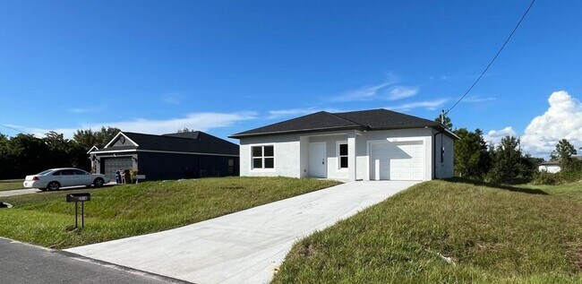 Building Photo - BRAND NEW 2/2/1- SW LEHIGH ACRES