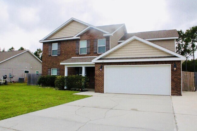 Foto del edificio - 44 Whisperwood Ln