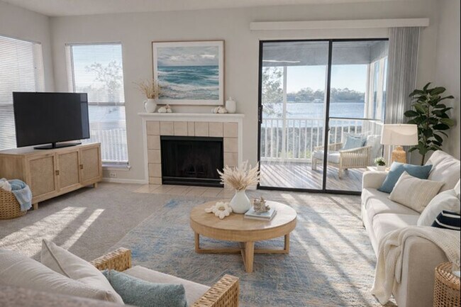 Sala de estar de St Croix con vista al río - Island Pointe