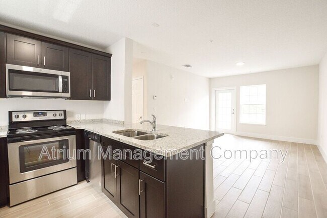 Foto del edificio - 5520 Lake Underhill Rd