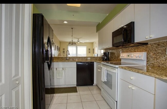 Building Photo - 8056 Queen Palm Ln