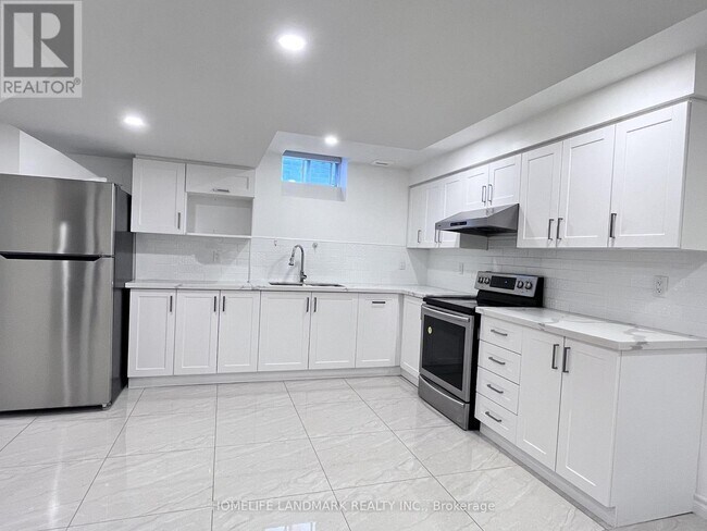 Photo du bâtiment - BSMT 55 MOHANDAS DRIVE