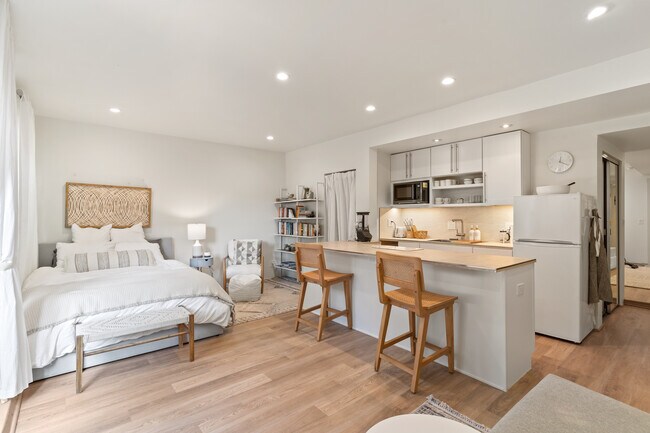 Main living area with kitchen - 724 Peralta Ave