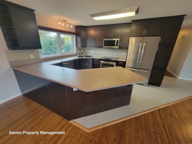 Photo du bâtiment - 7619 Rowland Rd NW