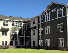Building Photo - The Apartments at Hawk Pointe