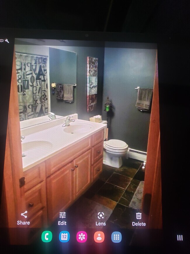 Updated bath with double vanity - 5400 Three Points Blvd