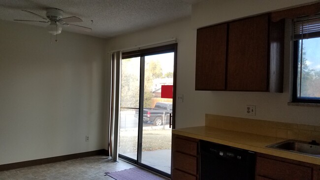 Patio door to fenced yard - 3620 Sheridan Ave