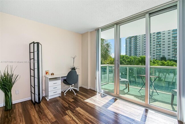 Building Photo - 19380 Collins Ave