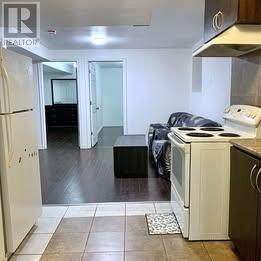 Photo du bâtiment - 40 Palm Tree Rd