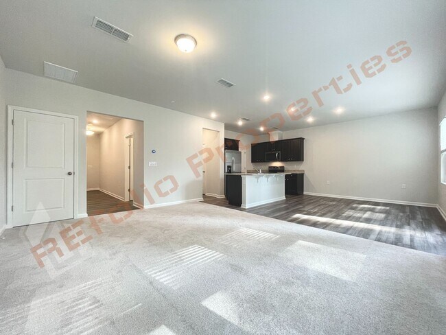 Building Photo - BRAND NEW Beautiful Townhouse Backed to Wo...