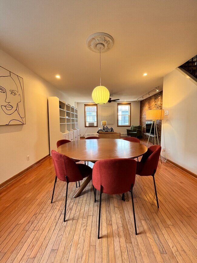 Dining Room Area with 6 person West Elm Table and Modern Light Fixtures - 1214 Moore St