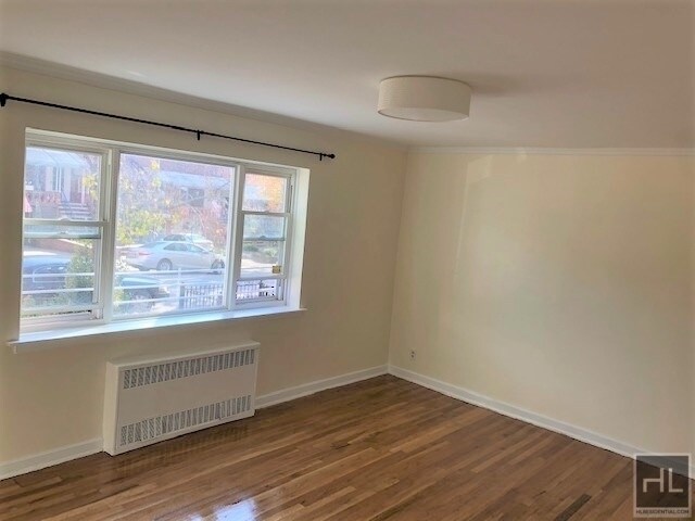 Building Photo - 48-34-48-38 38th St