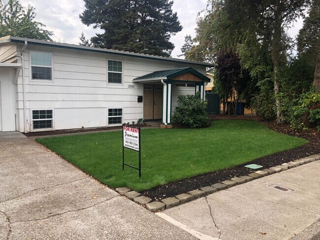 Building Photo - Updated Four Bedroom Home with New Lawn an...
