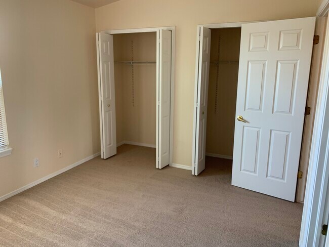 Bedroom 2, contains 2 closets, and has private bath - 6253 Colony Cir