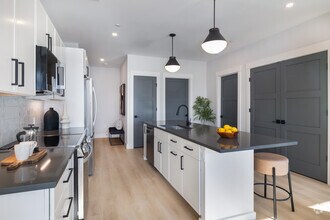 1BR, 1BA - 869SF - Kitchen - 100 Plank