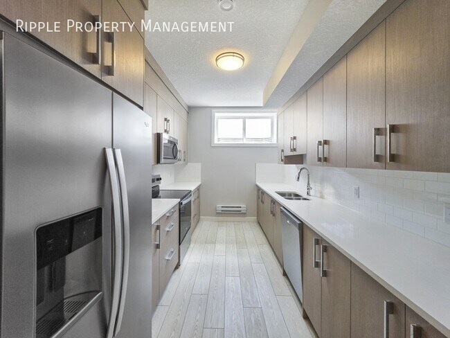 Building Photo - MODERN & COZY 1-BED, 1-BATH BASEMENT SUITE | PRIVATE ENTRY & IN-SUITE LAUNDRY