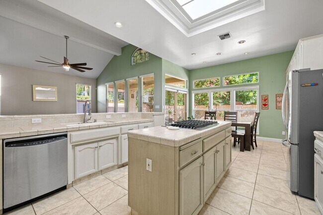 Building Photo - COMING AVAILABLE IN MAY! Spacious 3 Bedroom + Office in Seven Oaks with Pool, Hot Tub & Paid Solar!