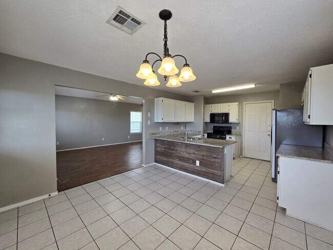 Building Photo - PRICE REDUCTION & AVAILABLE NOW!