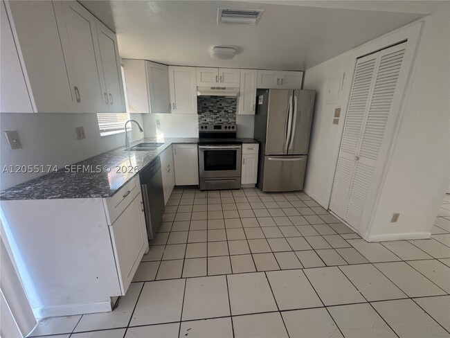 Building Photo - 2606 NW 52nd Ave