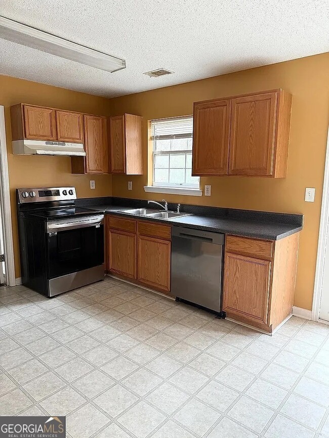 Building Photo - 1202 Pinedale Cir NW