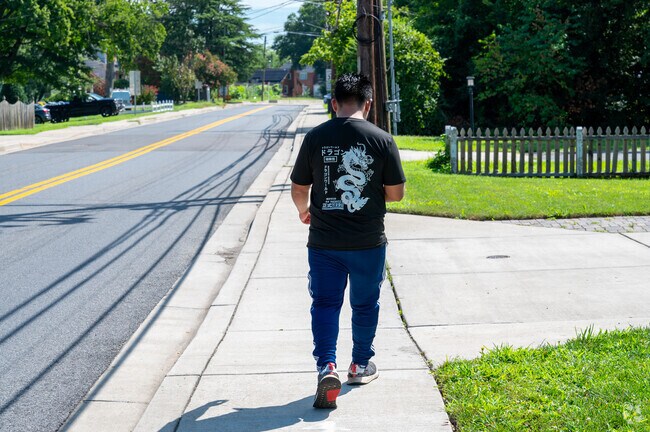 Residents stroll down 64th Ave in Landover.