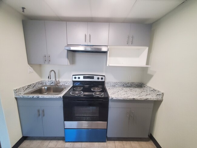 Building Photo - The 702