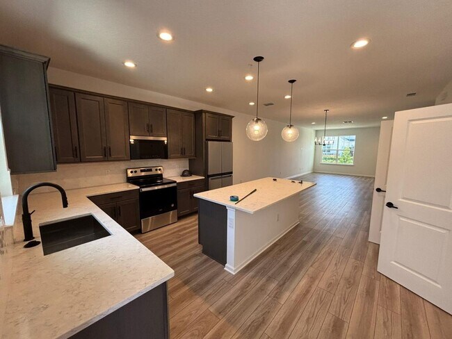 Building Photo - Brand-New Smart Townhome | Resort-Style Am...