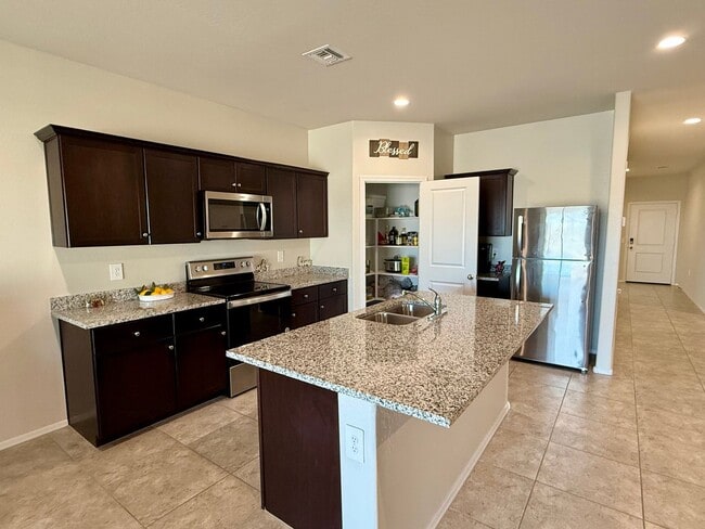 Building Photo - Large Newer-Built 4 Bedroom 2 Bathroom 3 Car Garage Home in Coolidge!