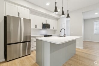 Building Photo - 21003-21025 25 Ave NW